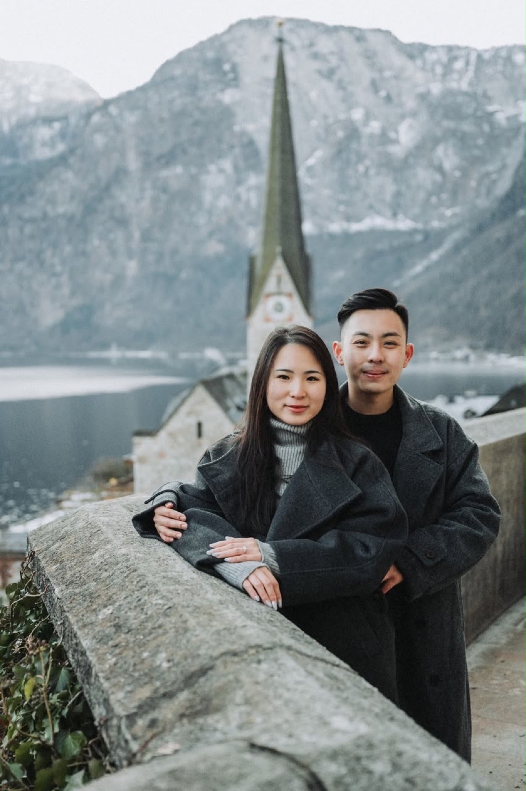 CK and Shean together in front of a lakeside mountain view